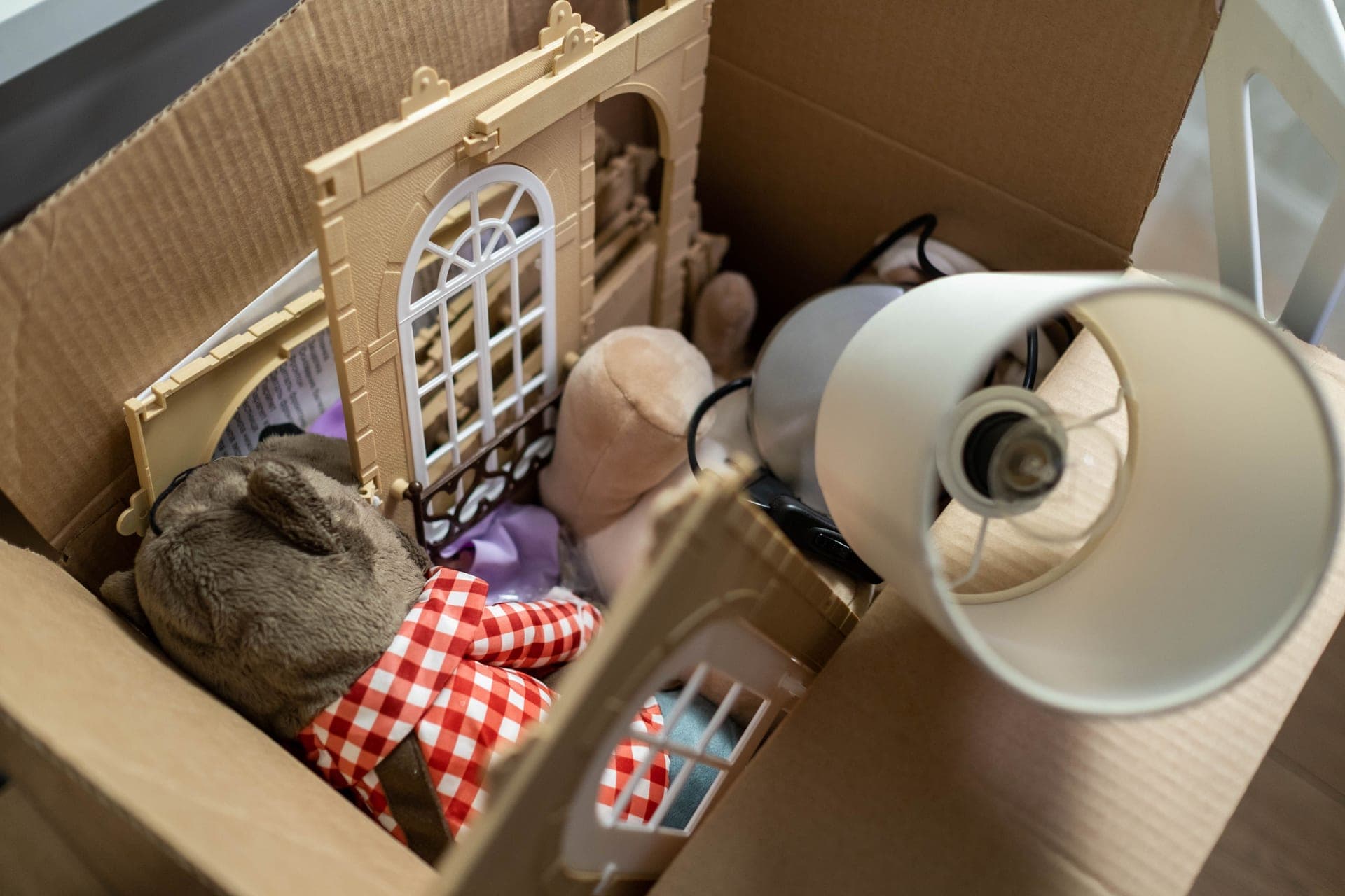Children's toys packed away in a storage box