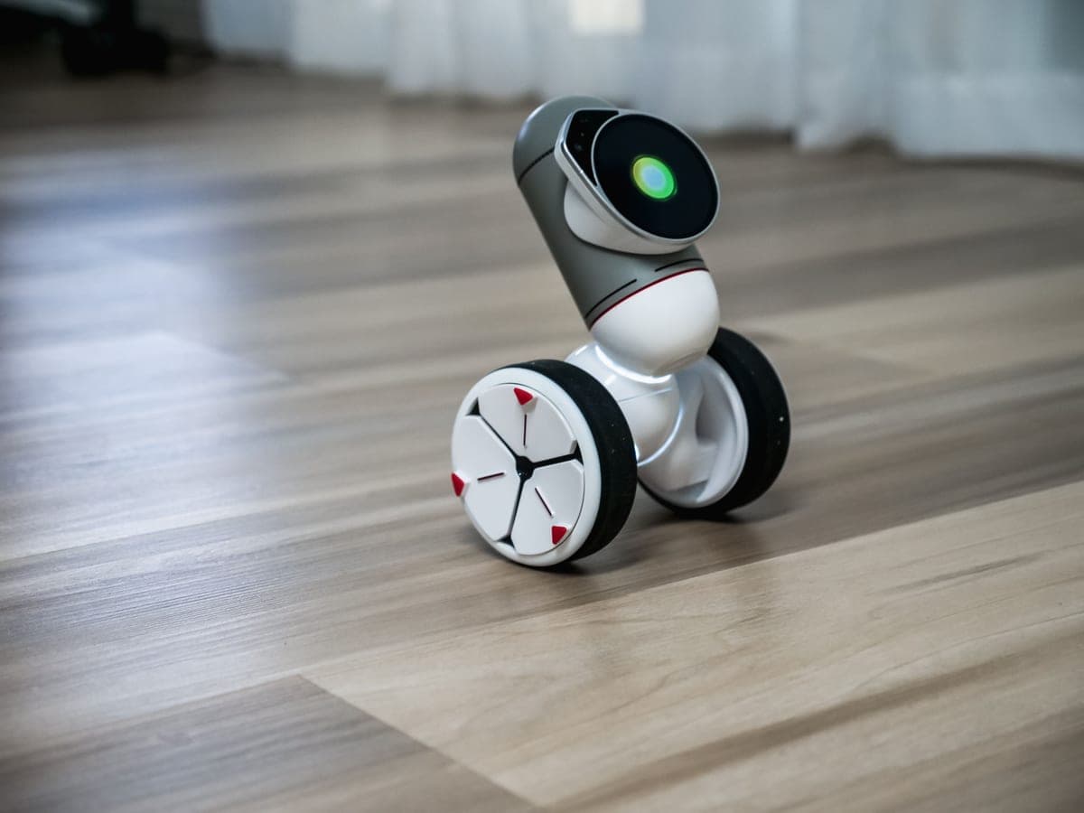 A small programmable robot toy on the floor