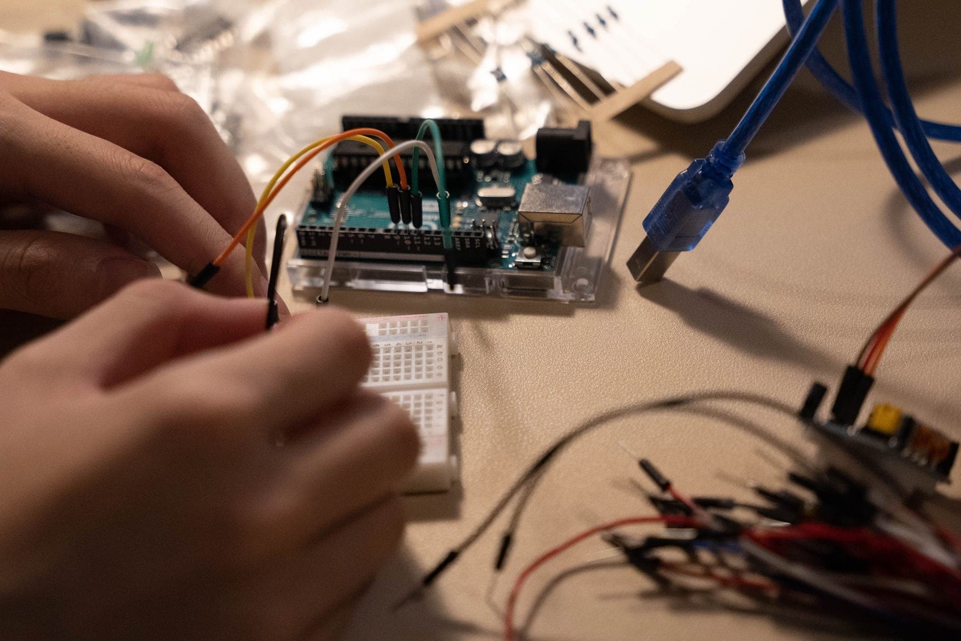 Electronic components and wires on a workbench