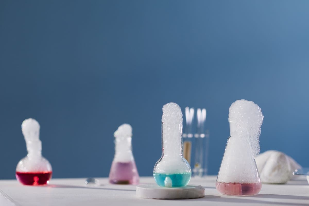 A child running a colorful science experiment