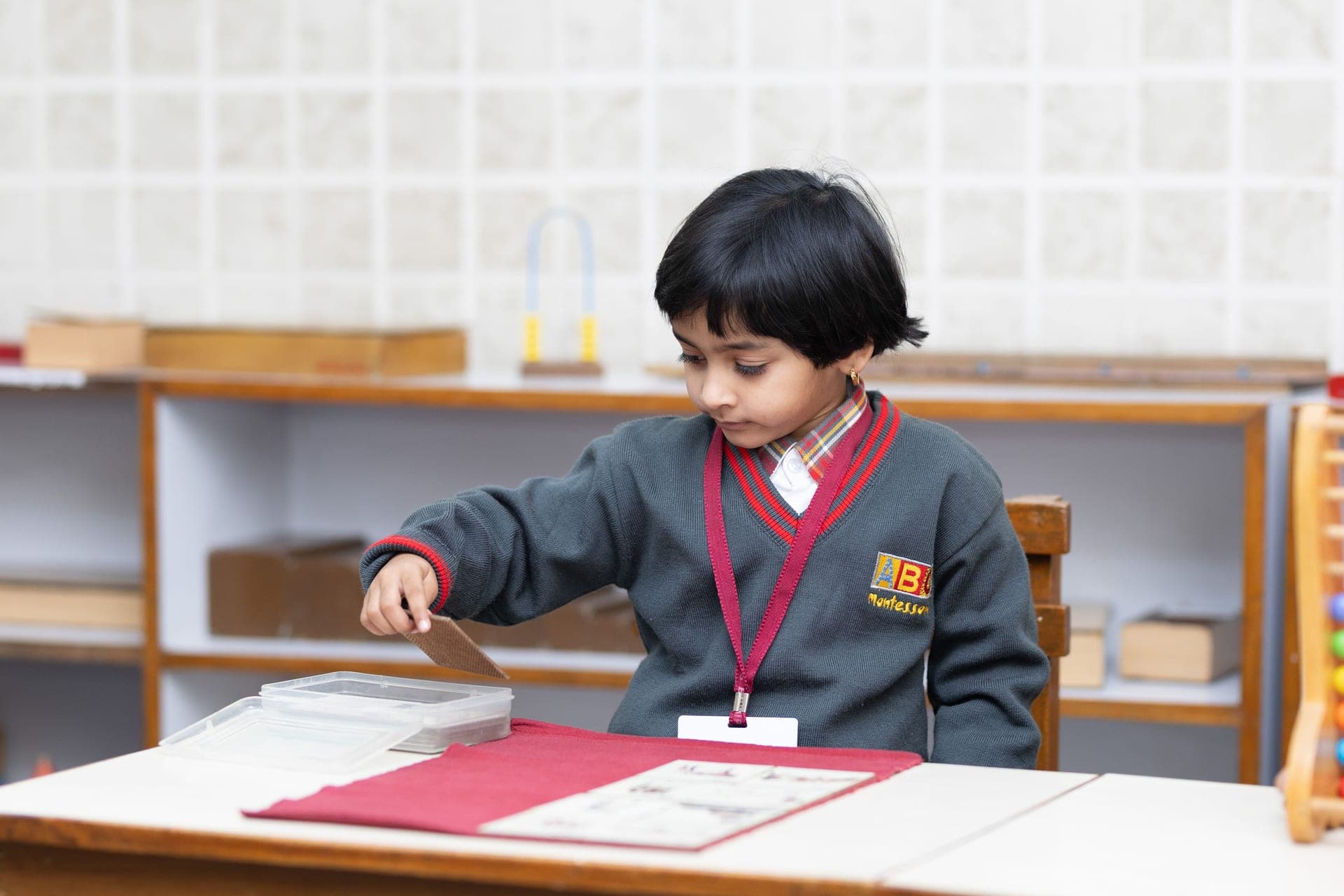 A child concentrating on an educational activity
