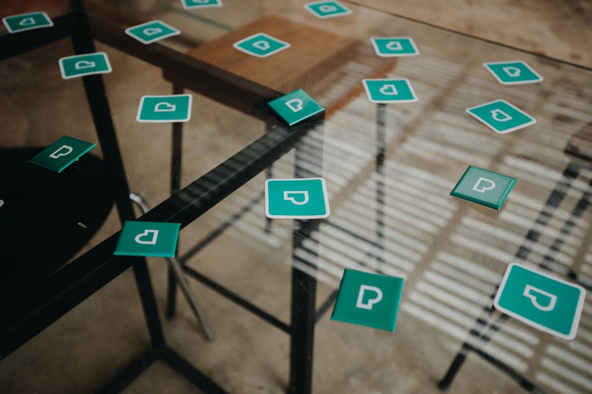 Magnetic tile shapes spread out on a wooden floor
