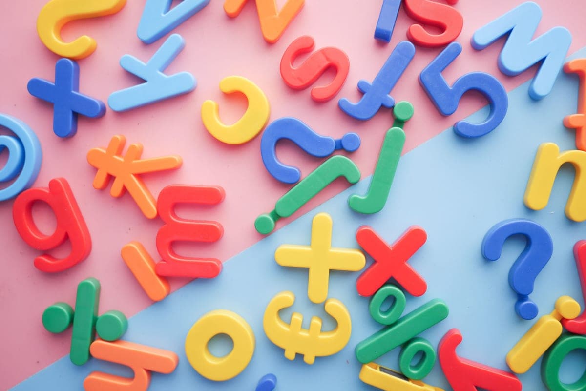 Colorful magnetic construction shapes arranged on a table