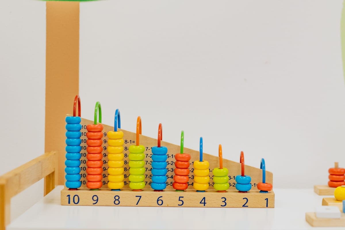 Children counting with colorful math manipulatives