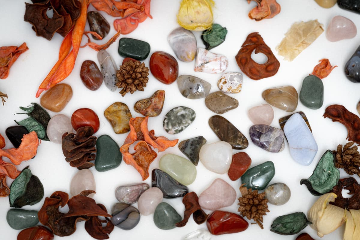 A collection of polished colorful gemstones and minerals