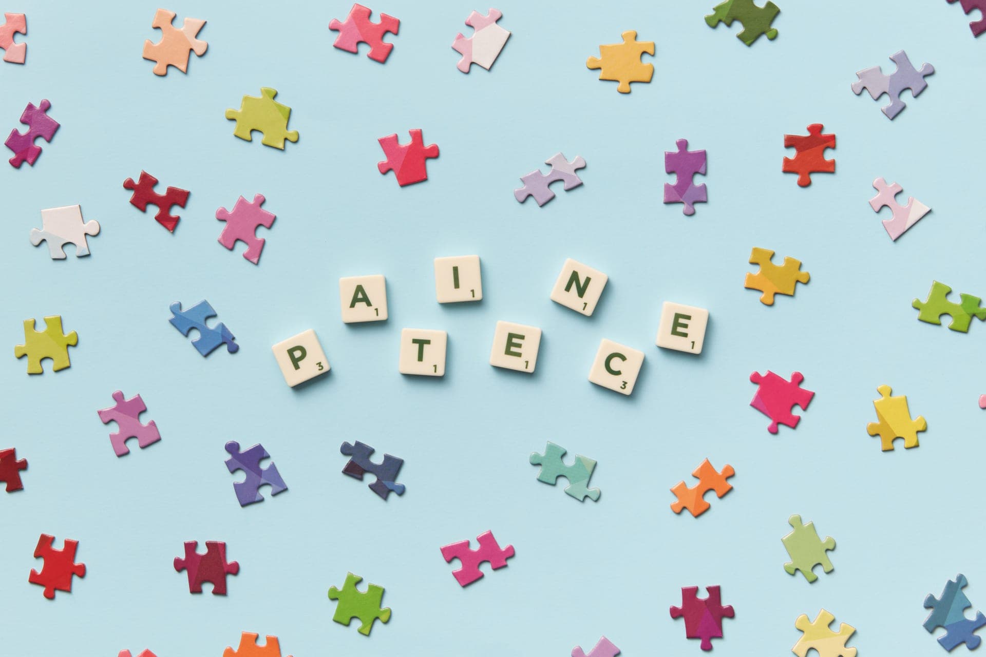 Colorful puzzle pieces on a small board