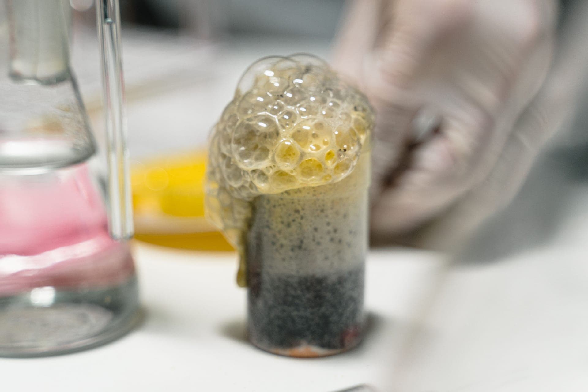 A child watching a bubbling science experiment