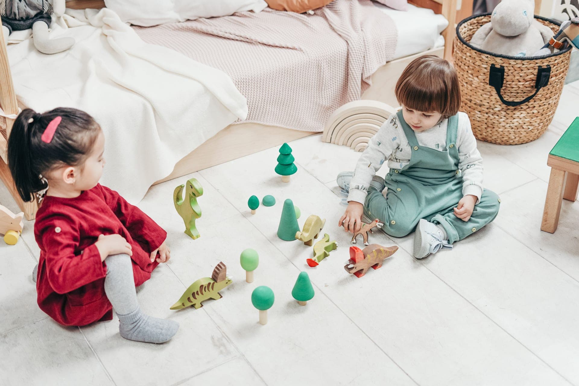 Two children playing with construction toys together