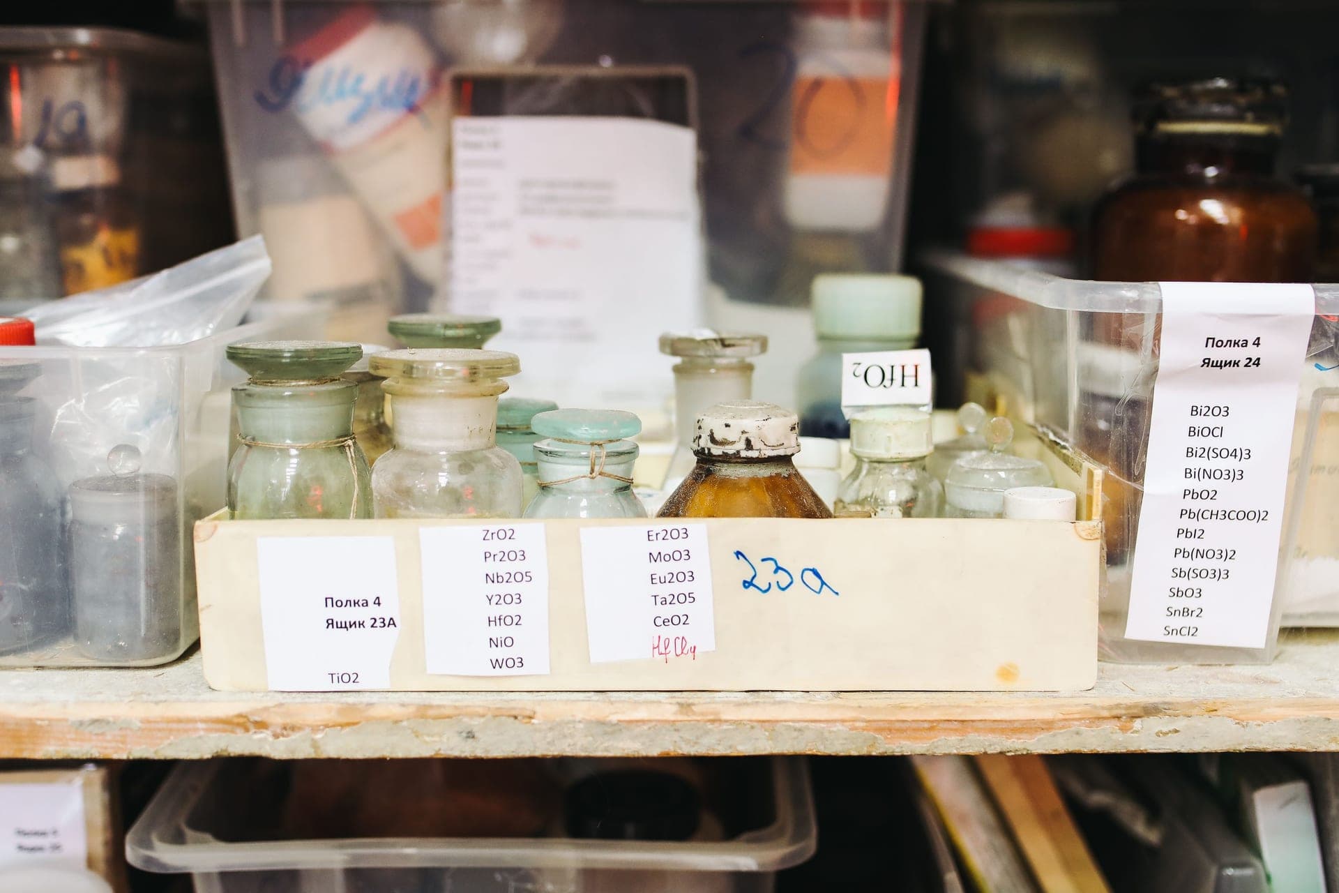 A shelf of science equipment and specimen jars