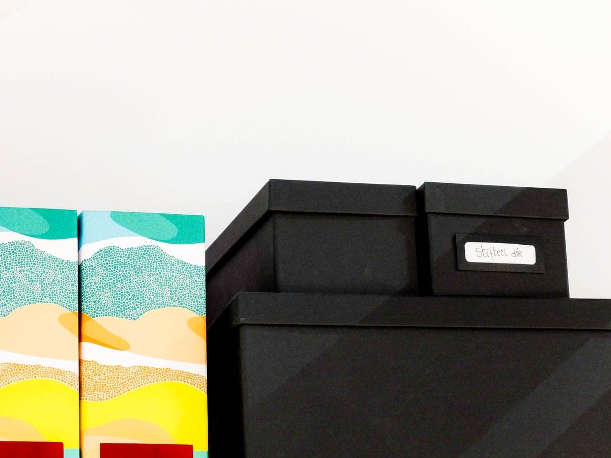 Tidy shelves with storage boxes for toys