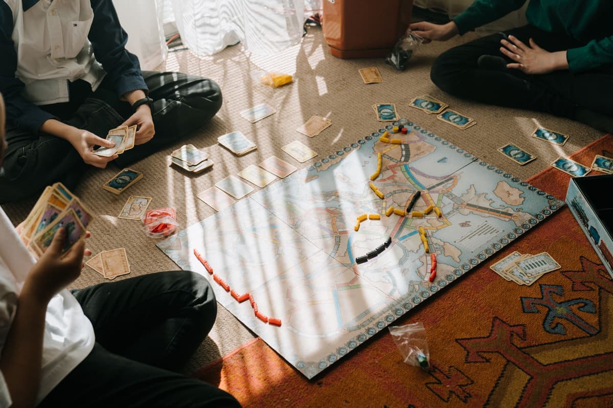 A family playing a strategy board game together